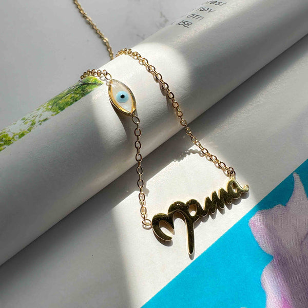 'Mama' steel necklace and split mother-of-pearl eyelet Golden Elephantina