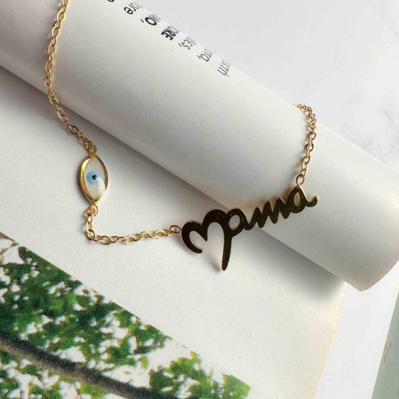 'Mama' steel necklace and split mother-of-pearl eyelet Golden Elephantina
