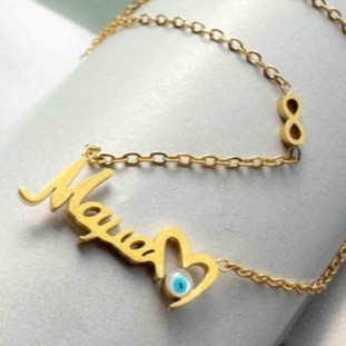 Love 'Mama' steel necklace and mother-of-pearl eye Golden Elephantina